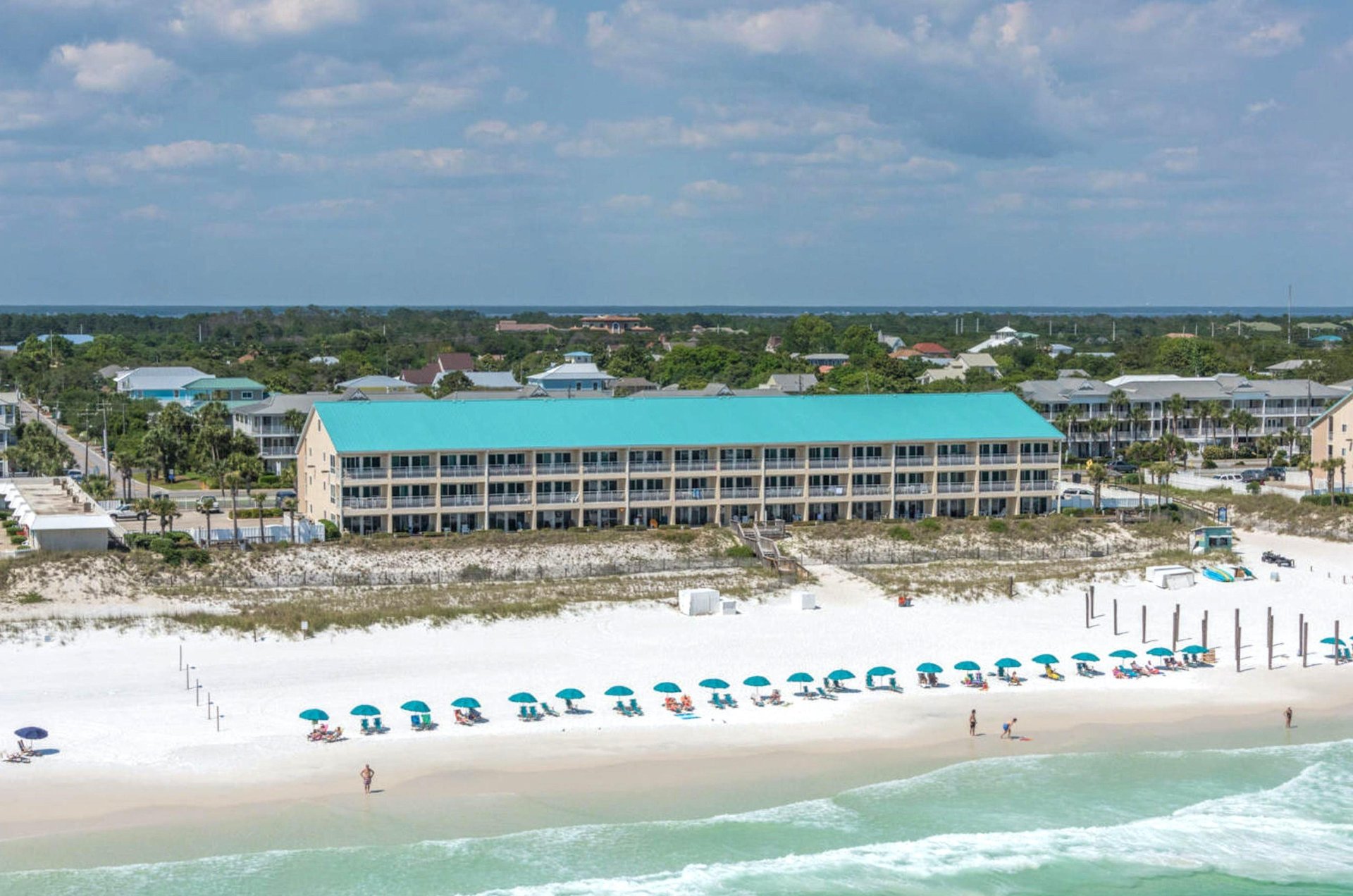 Crystal Sands nestled alongside a beautiful Destin beach.