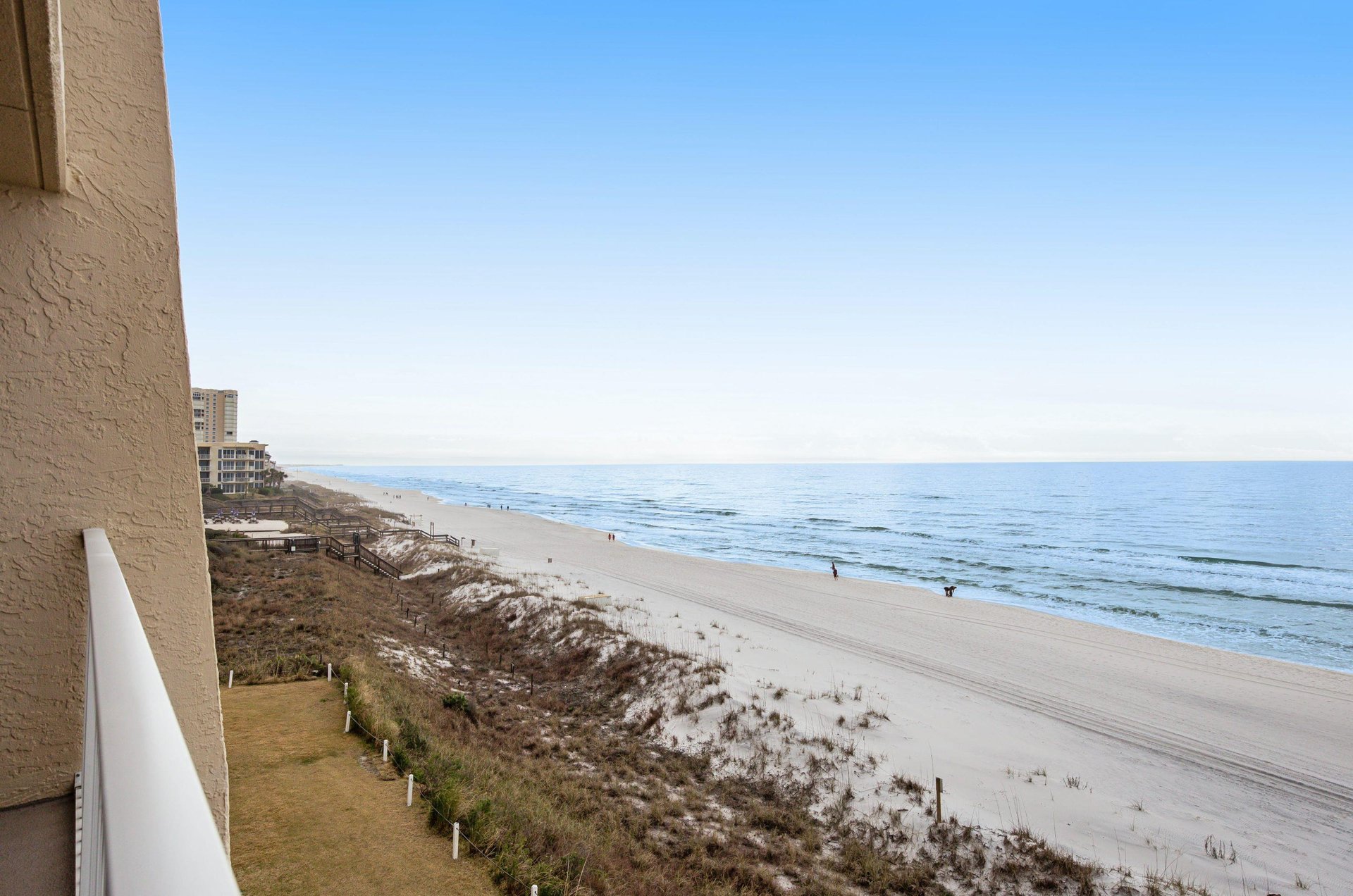Late afternoon on the beautiful beach by Beach House Condominiums.