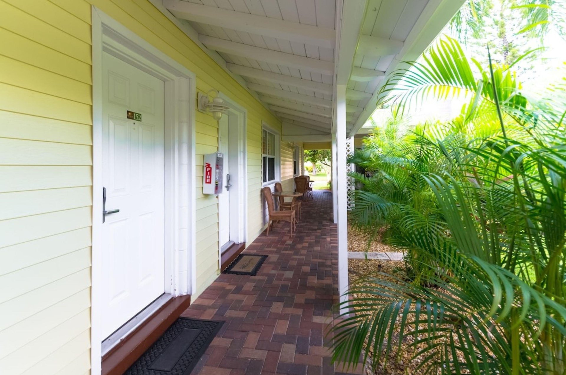 The covered walkway in front of the rooms at Tropical Beach Resorts in Siesta Key Florida