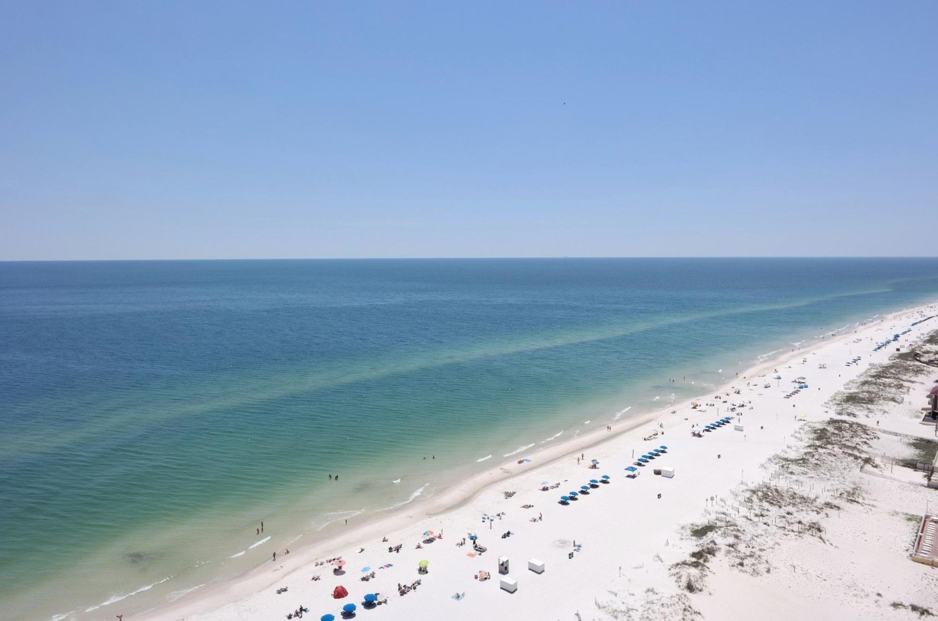 Birds eye view of the beach and the Gulf at Island Tower in Gulf Shores Alabama