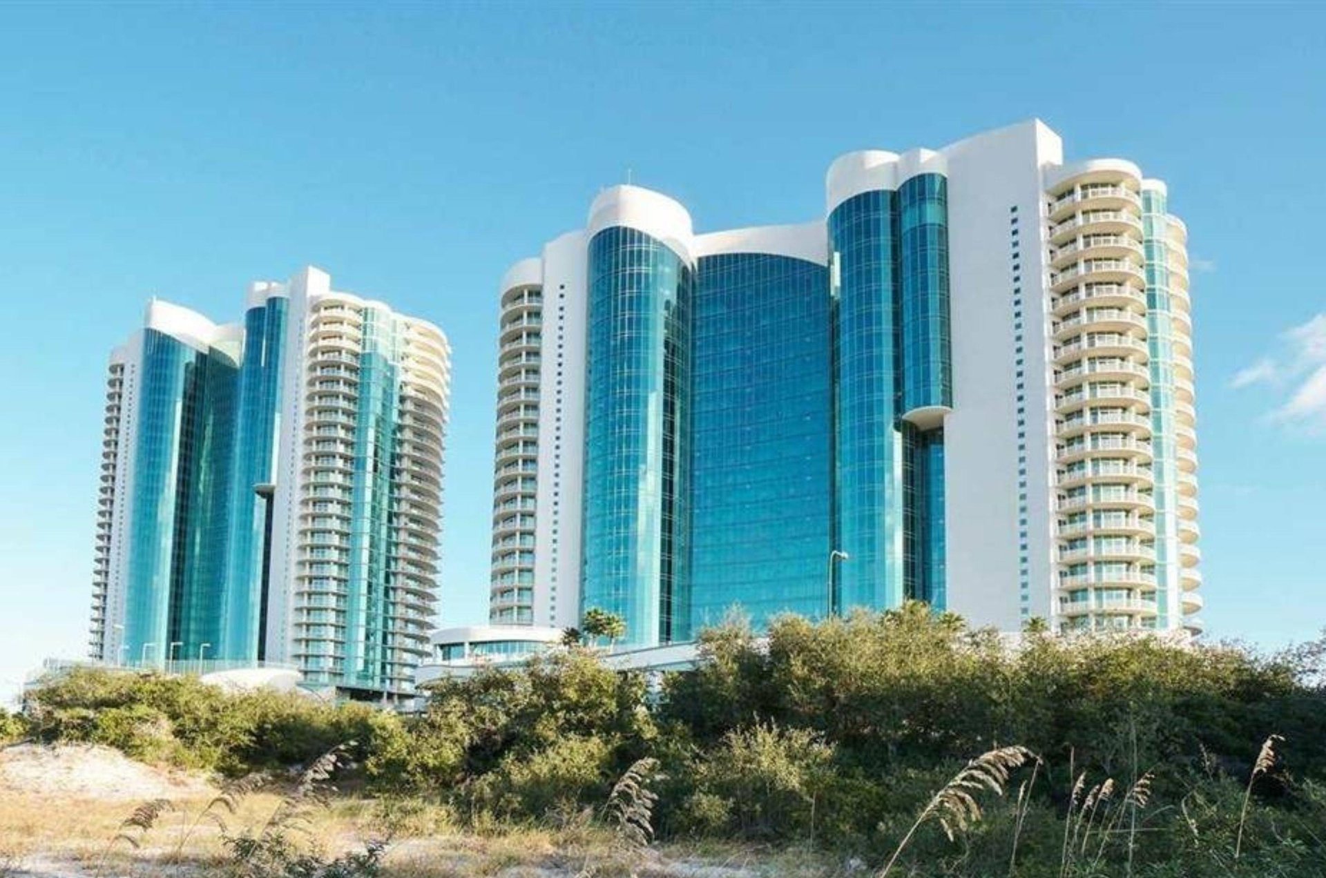 The beautiful streetside exterior of Turquoise Place Condominiums in Orange Beach Alabama