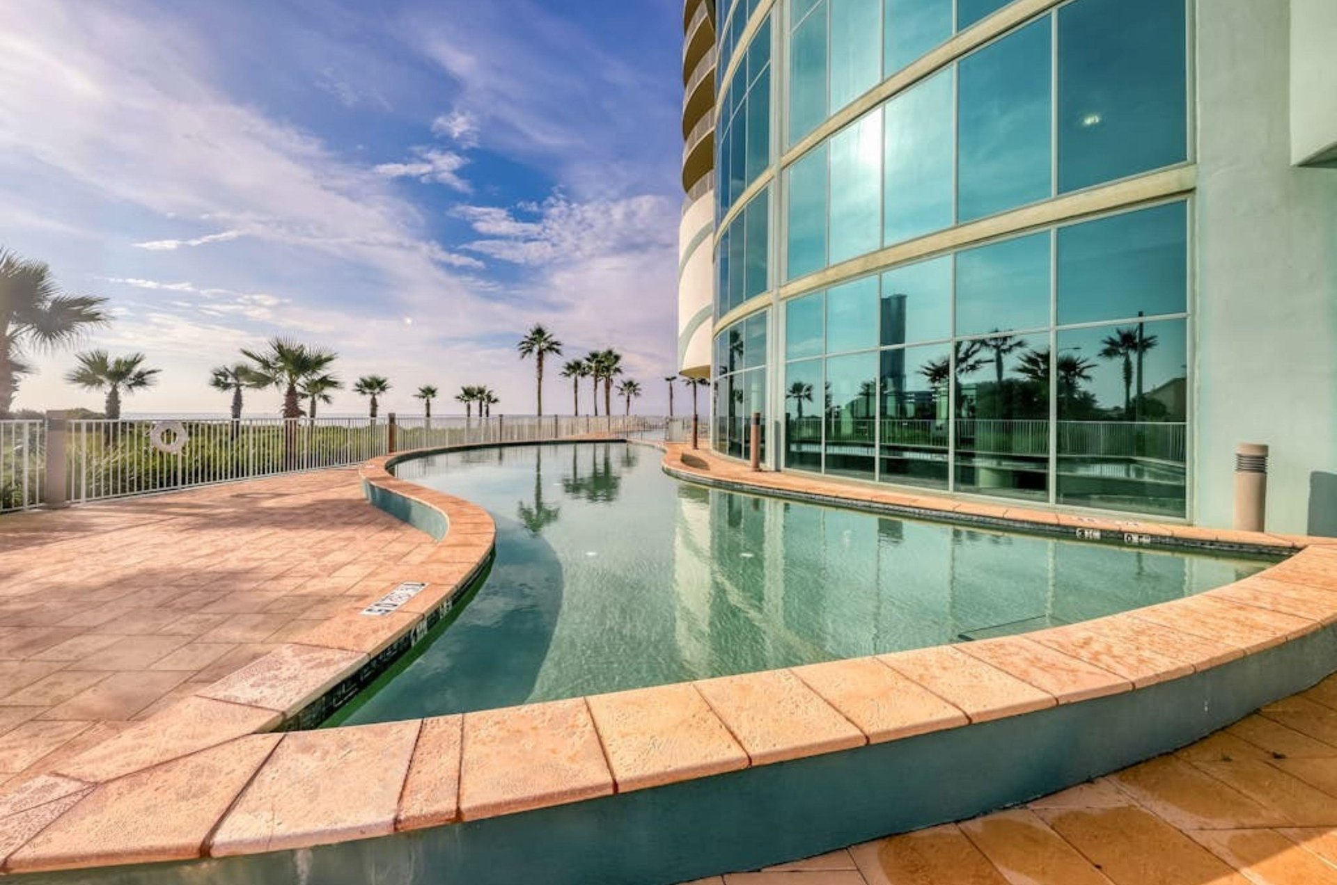 The outdoor swimming pool in front of Turquoise Place in Orange Beach Florida