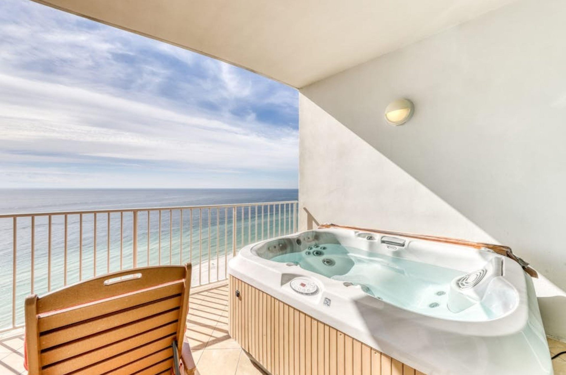 A hot tub on a private balcony at Turquouise Place overlooking the Gulf of Mexico