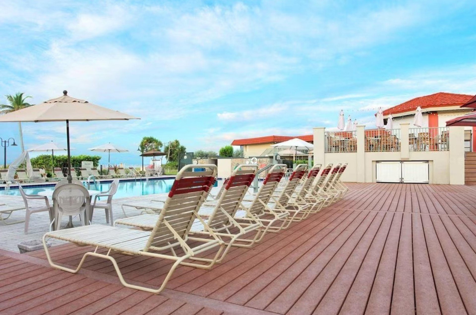 Unwind on the spacious, beachfront pool deck