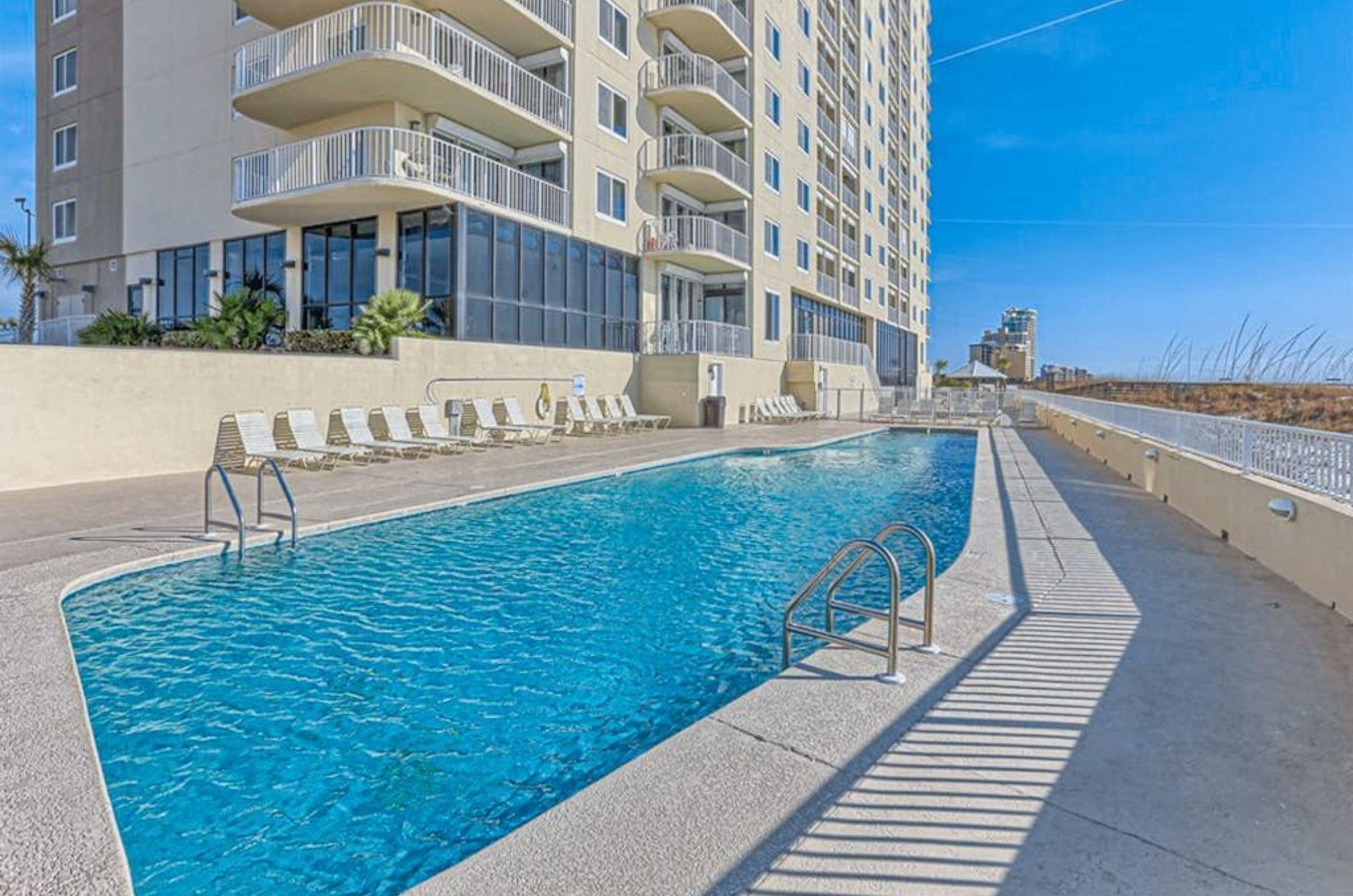 The beachfront swimming pool in front of Summerchase Condos in Orange Beach Alabama