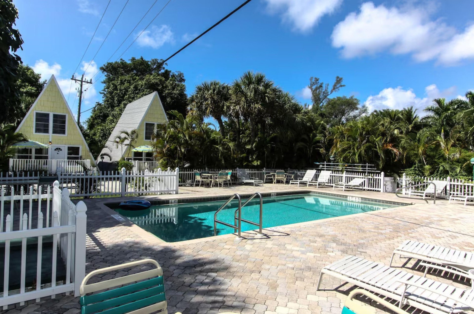 Unwind by the water with poolside lounge chairs