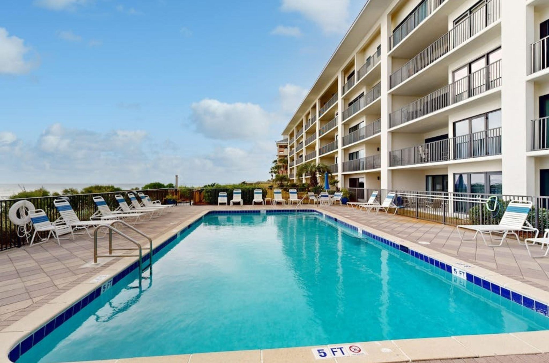 Take a dip in the sparkling outdoor pool at Huntington by the Sea