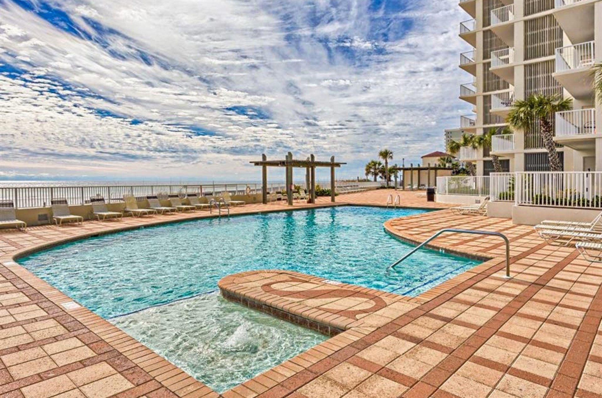 The outdoor swimming pool at Shoalwater Condominiums in Orange Beach Alabama
