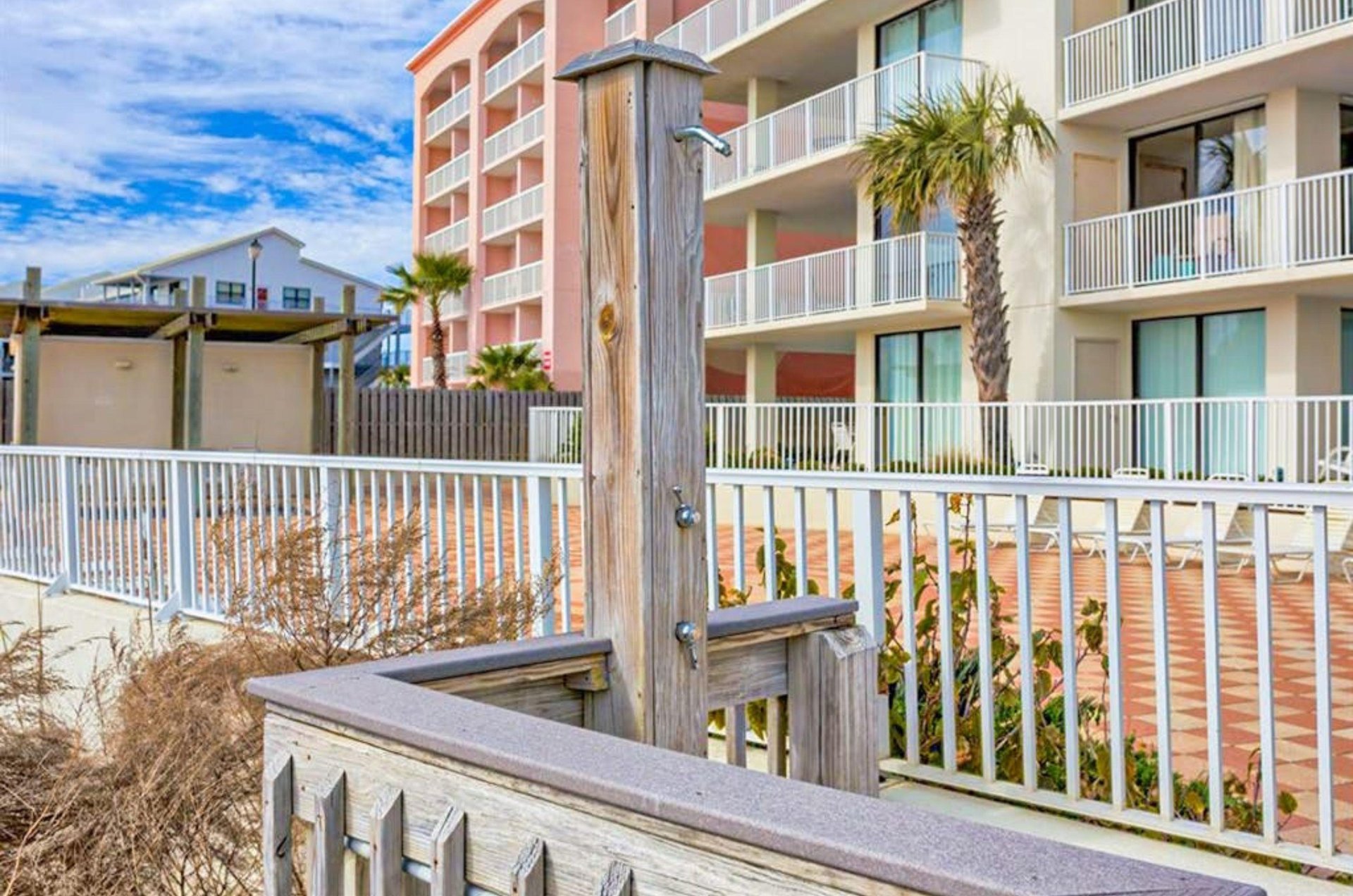 The outdoor shower at the boardwalk at Shoalwater Condominiums in Orange Beach Alabama
