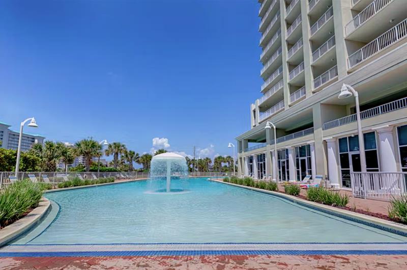 The pool with a mushroom fountain provides a great place to splash and play.