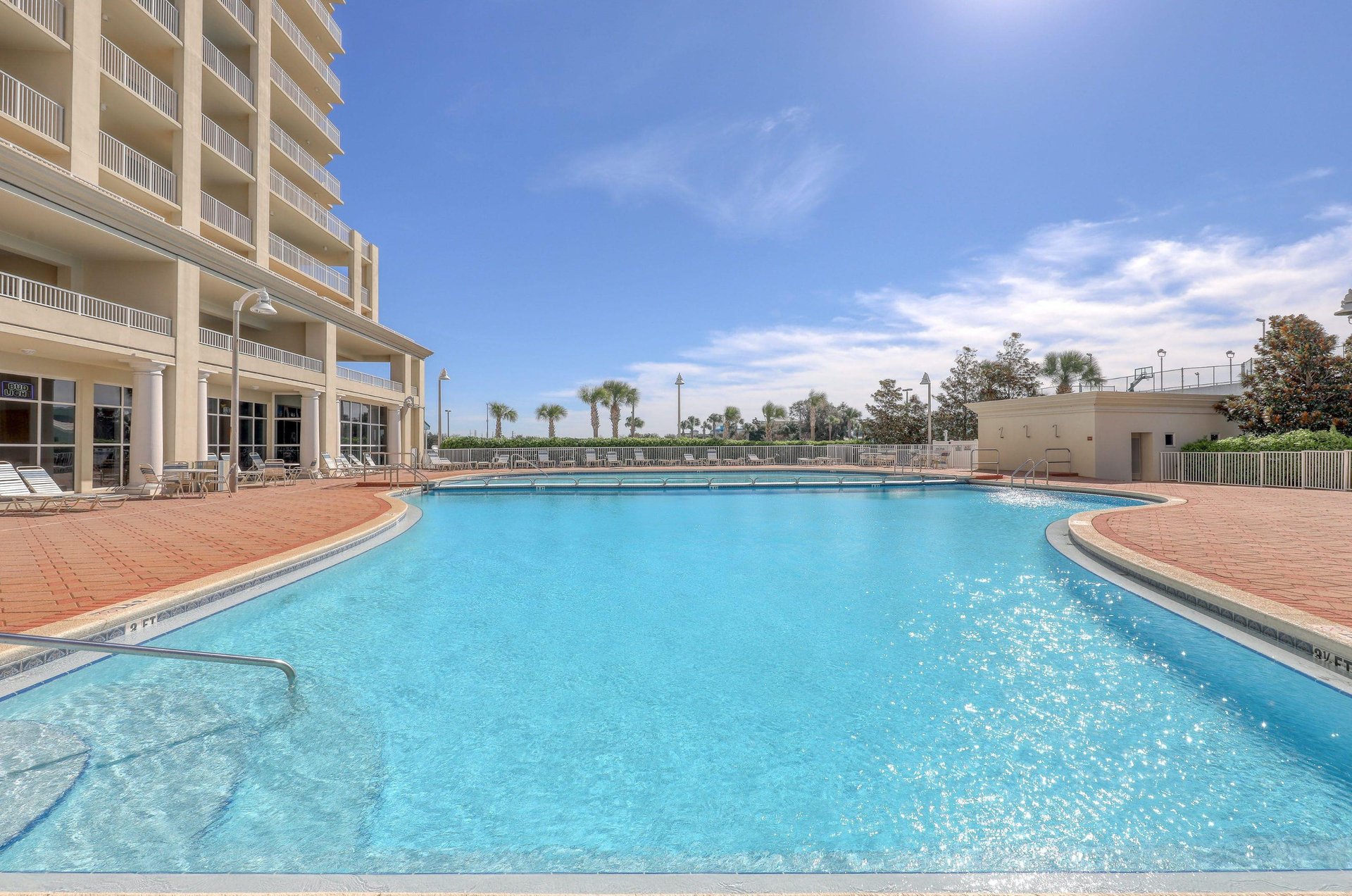 This swimming pool shimmers under the summer sun.