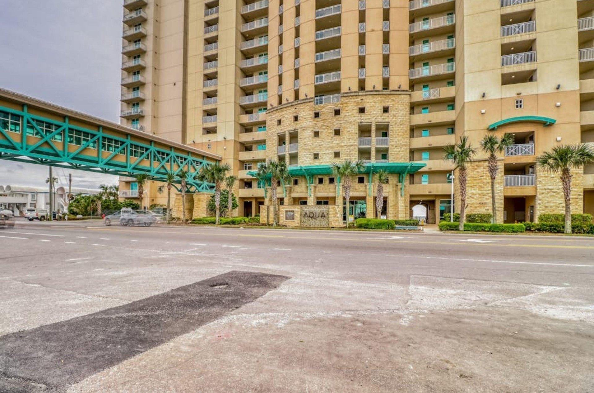 View from the street looking up at the exterior of Aqua Resort