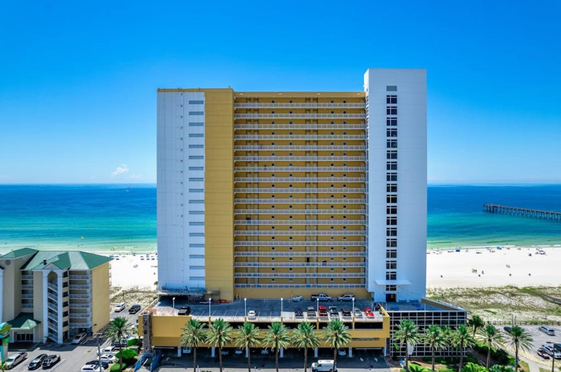 Aerial view of the streetside exterior of Sterling Reef Condos in Panama City Beach Florida
