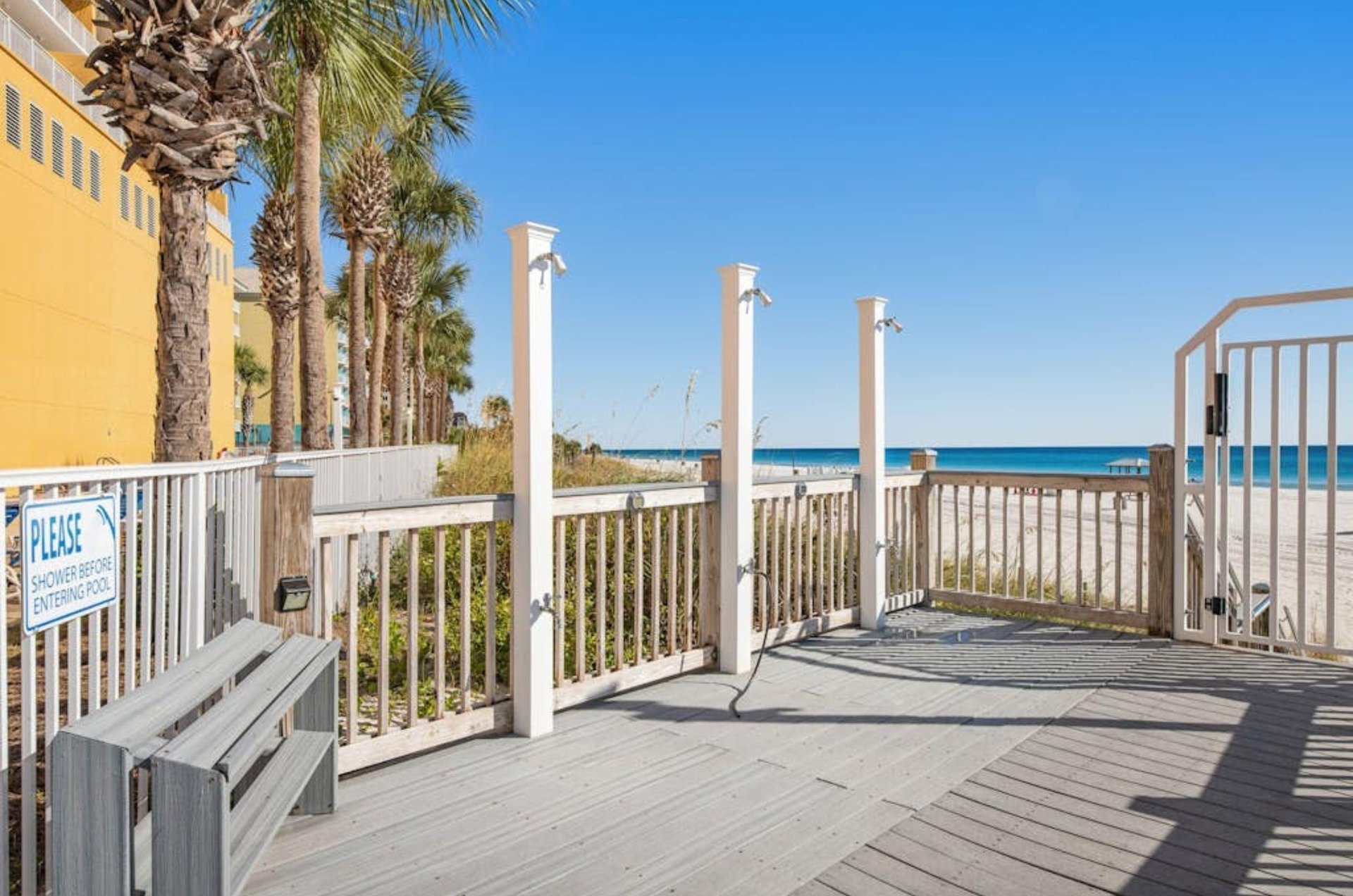 The outdoor showers on the boardwalk at Sterling Reef in Panama City Beach Florida