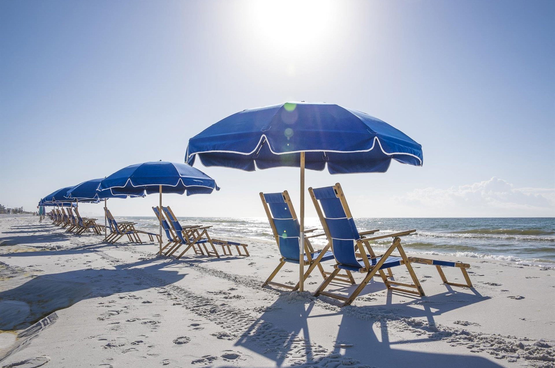 Beach chairs and umbrellas along the shore next to the complex provide great places to relax in the shade.