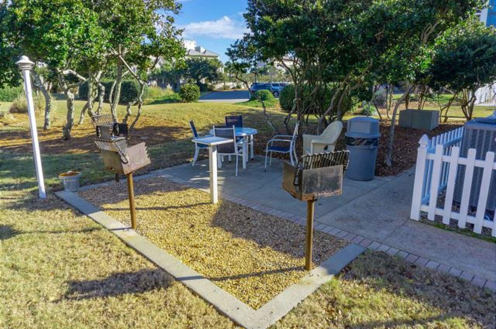A charcoalgrill patio with tables and chairs provides a convenient onsite spot to cook and eat meals in the great outdoors.