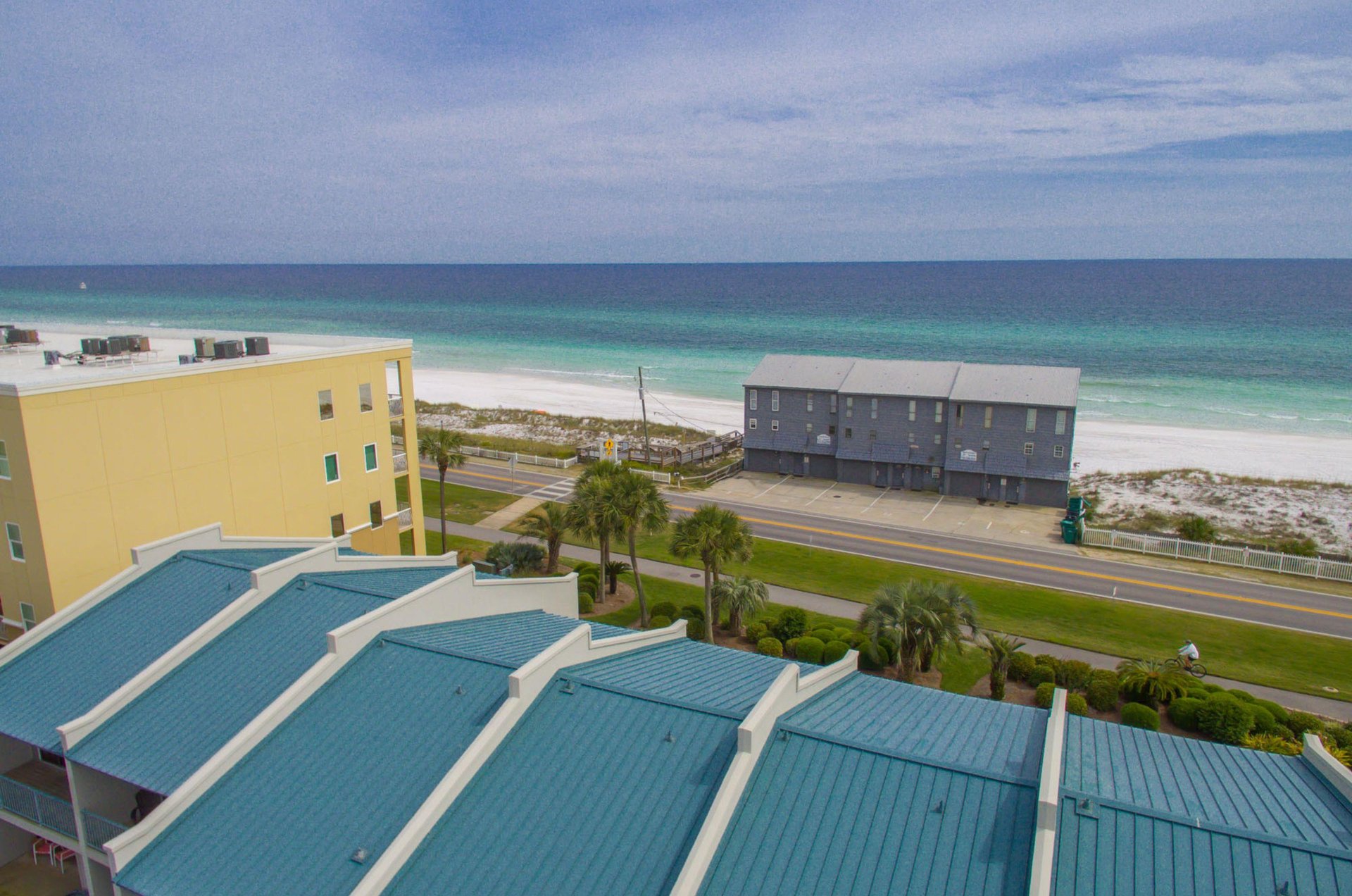 Aerial view of the complexs close proximity to the beach.