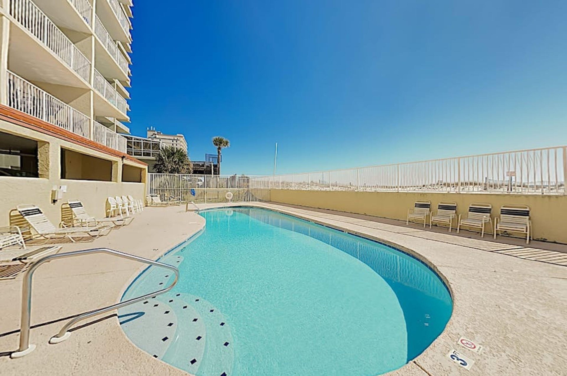 The beachside pool in front of Clearwater Condos in Gulf Shores Alabama