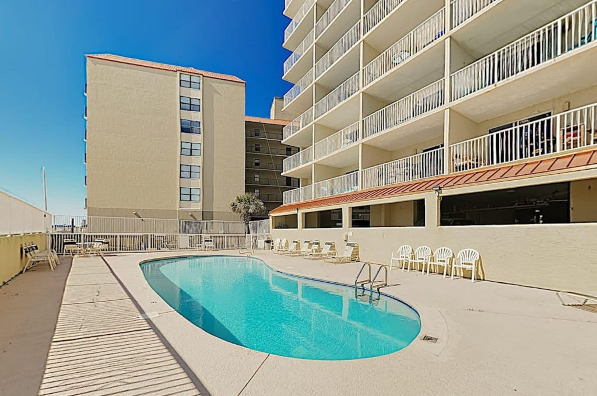 The sparkling outdoor swimming pool at Clearwater Condominiums