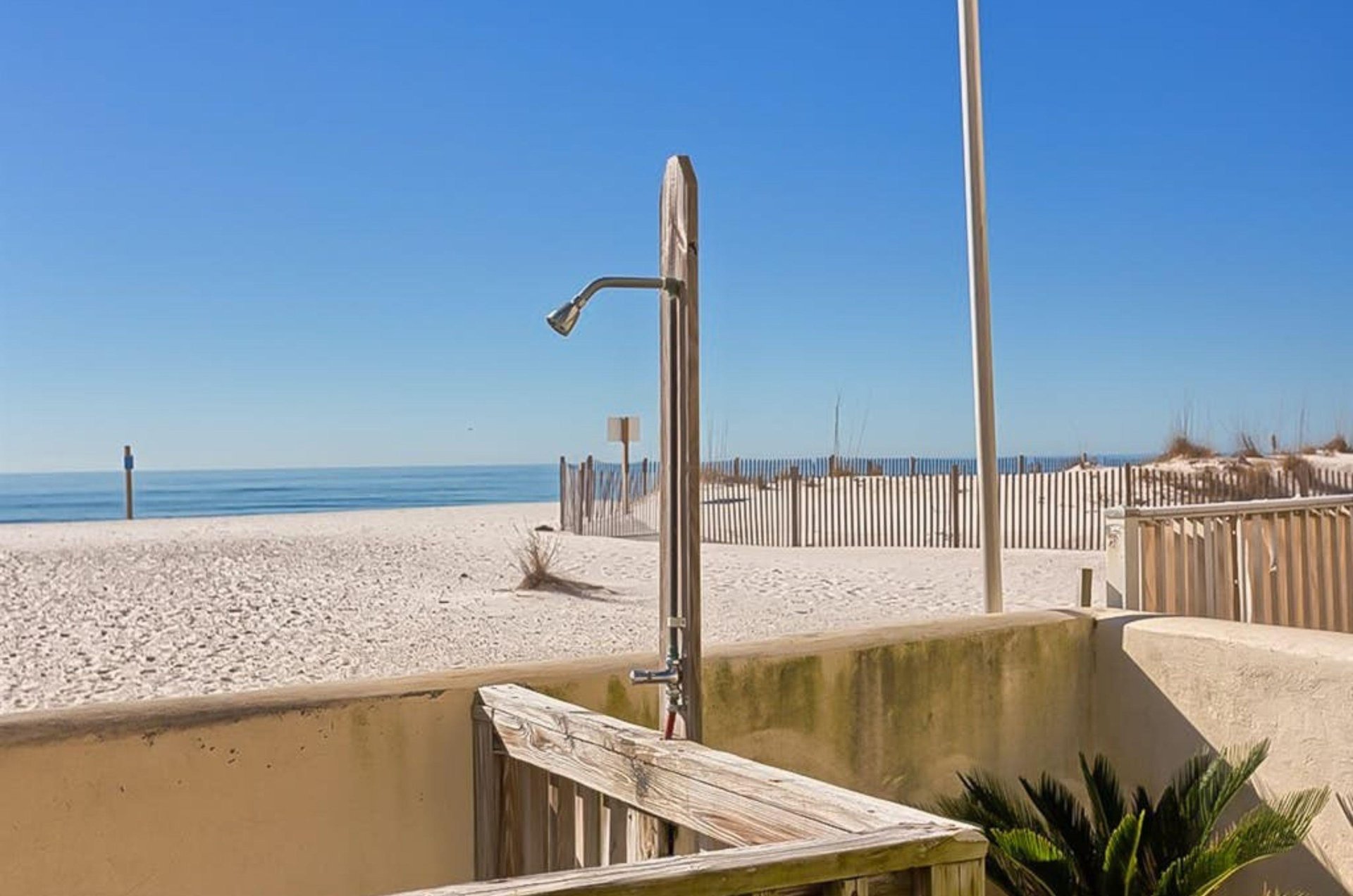 The outdoor shower on the boardwalk at Clearwater Condominiums in Gulf Shores Alabama