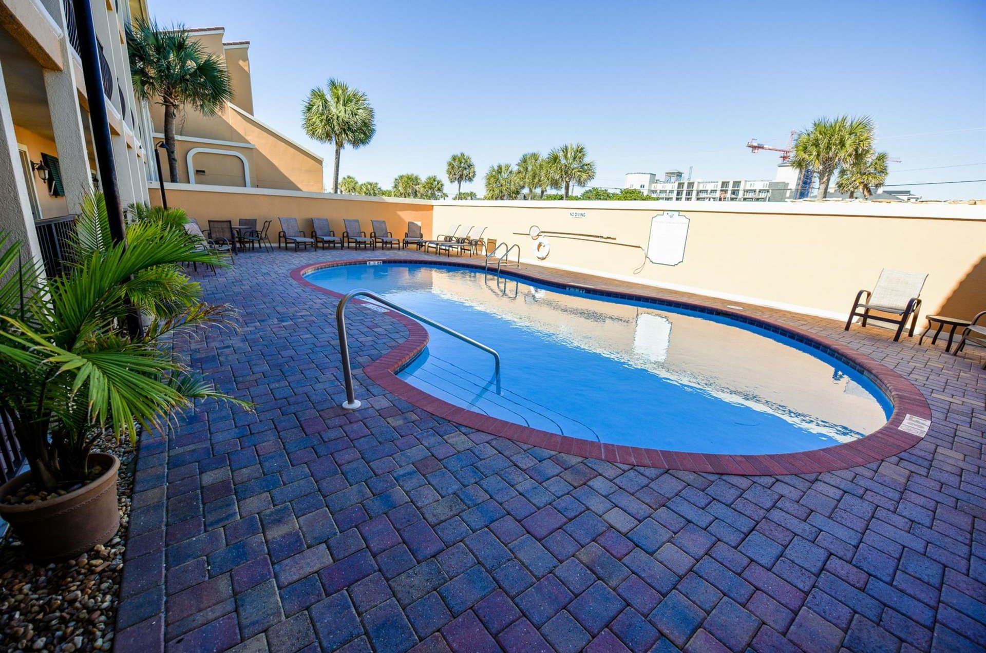 Coral Reefs swimming pool, sundeck, and lounge chairs.