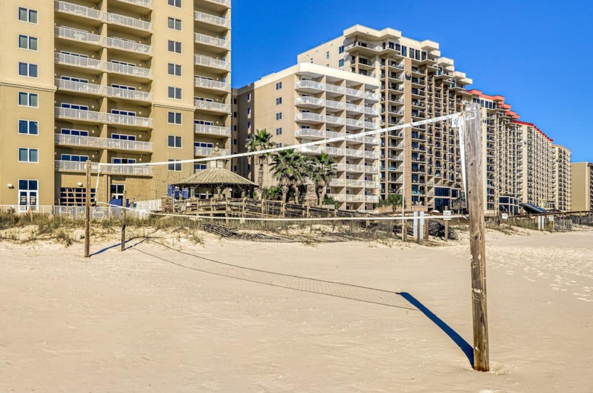 The beach volleyball court in front of Escapes to the Shores in Orange Beach Alabama