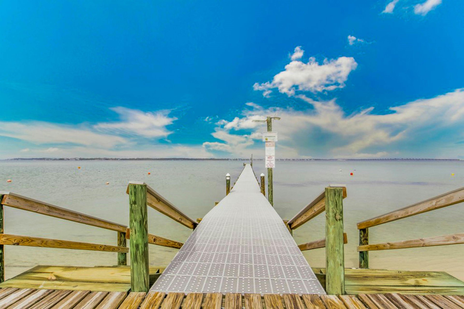 The property provides access to a private fishing pier on the Sound