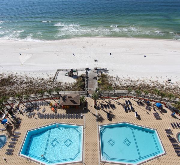Aerial view of the beachfront pools at En Soleil Panama City Beach Florida