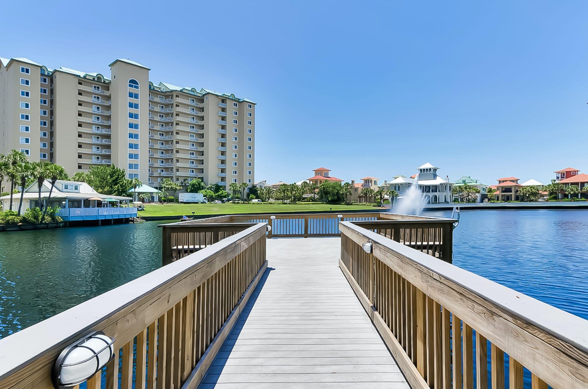 A pier extending out over a community lake.