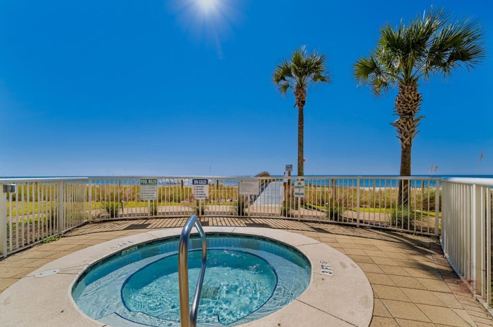 The beachside hot tub at Sandy Key Condominiums