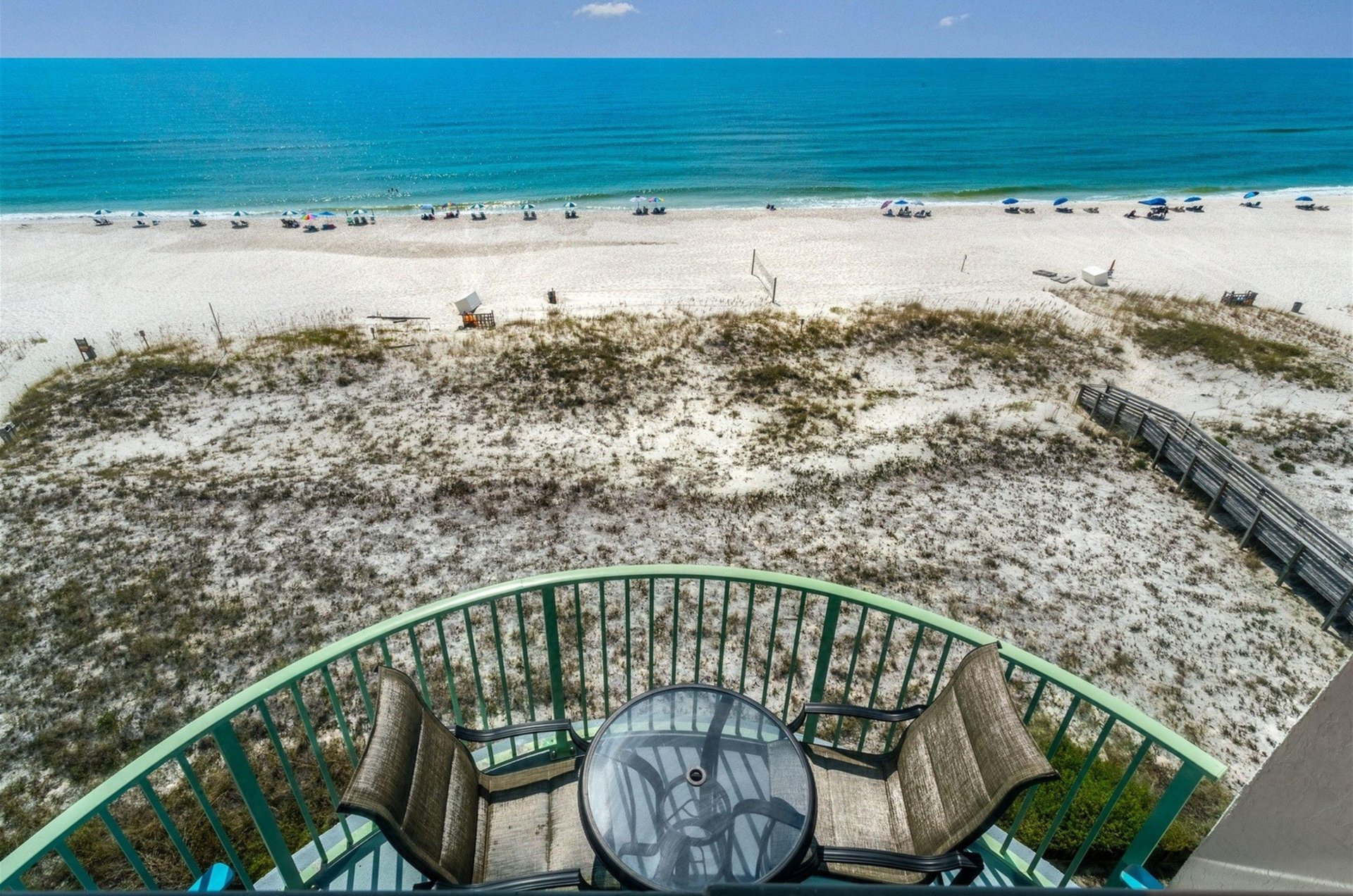 Unwind on a private balcony with spectacular beach and water views