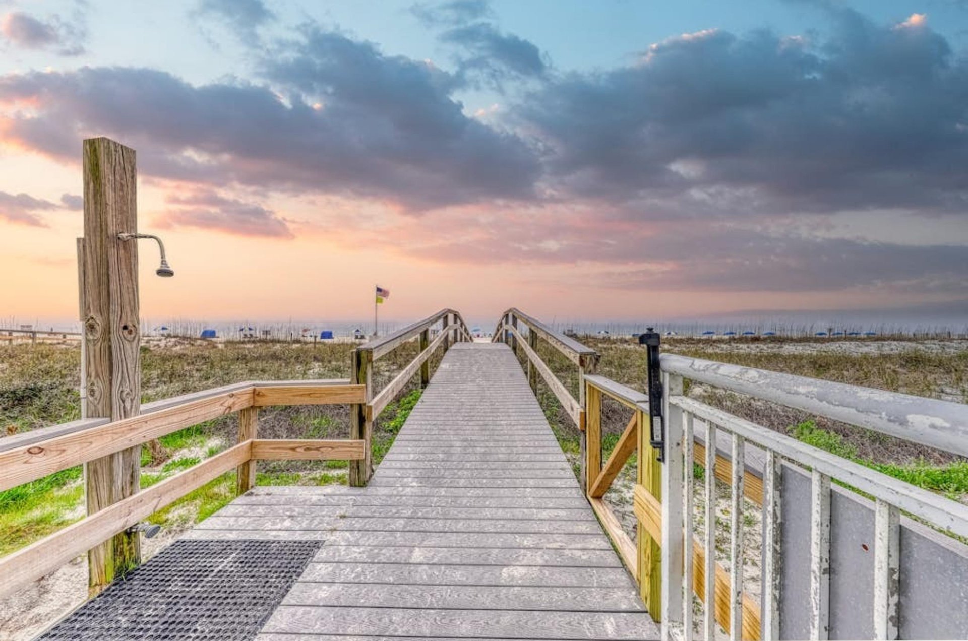 The wooden boardwalk leading to the Gulf of Mexico at Perdido Sun