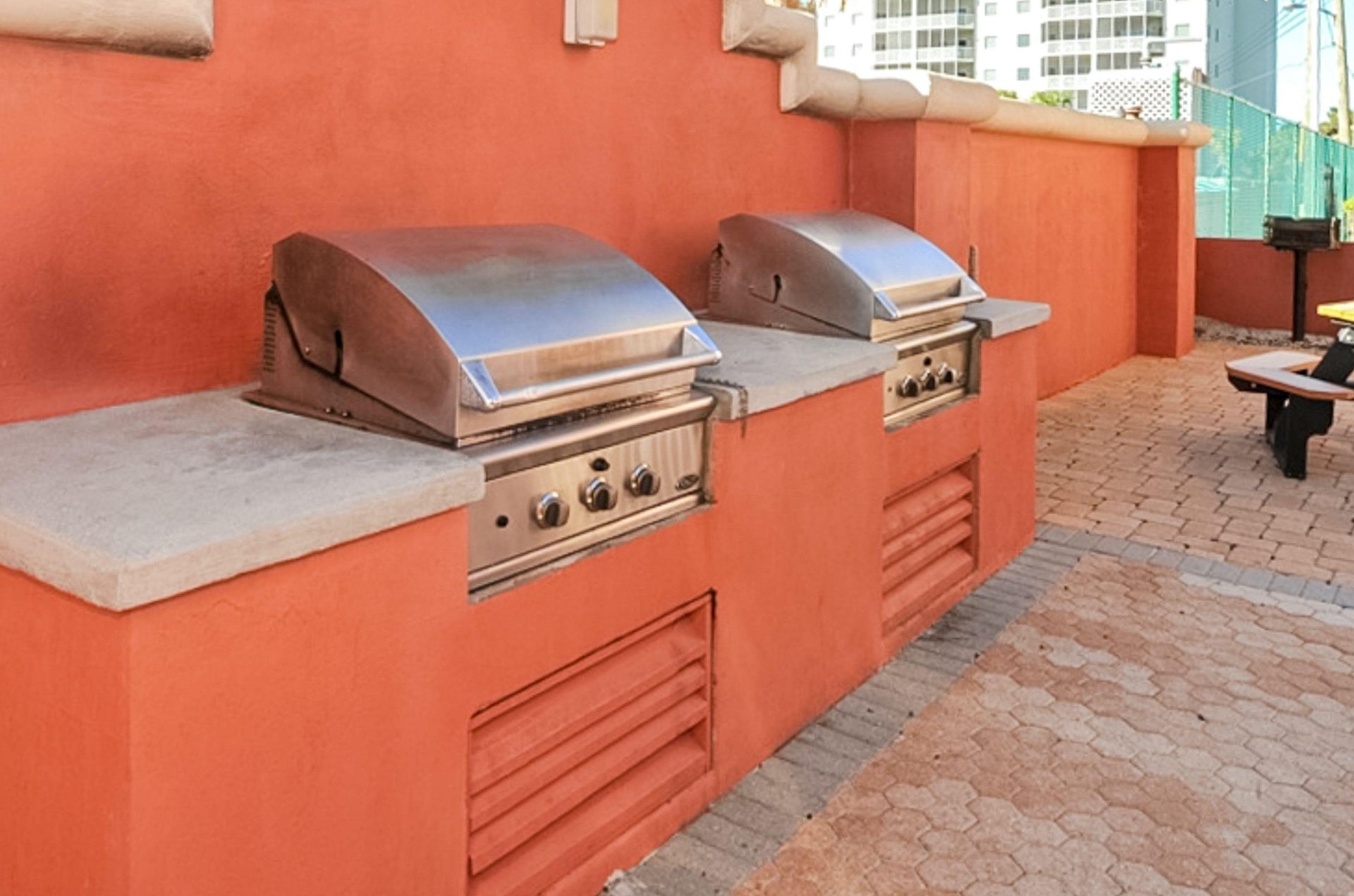 Gas grills stand ready for easy meal preperations.