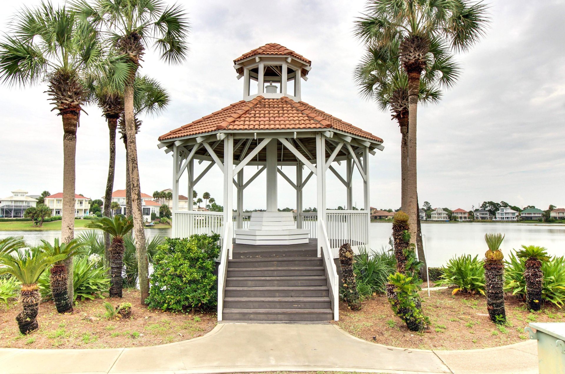 A community gazebo provides seating and views of a rare coastal dune lake.