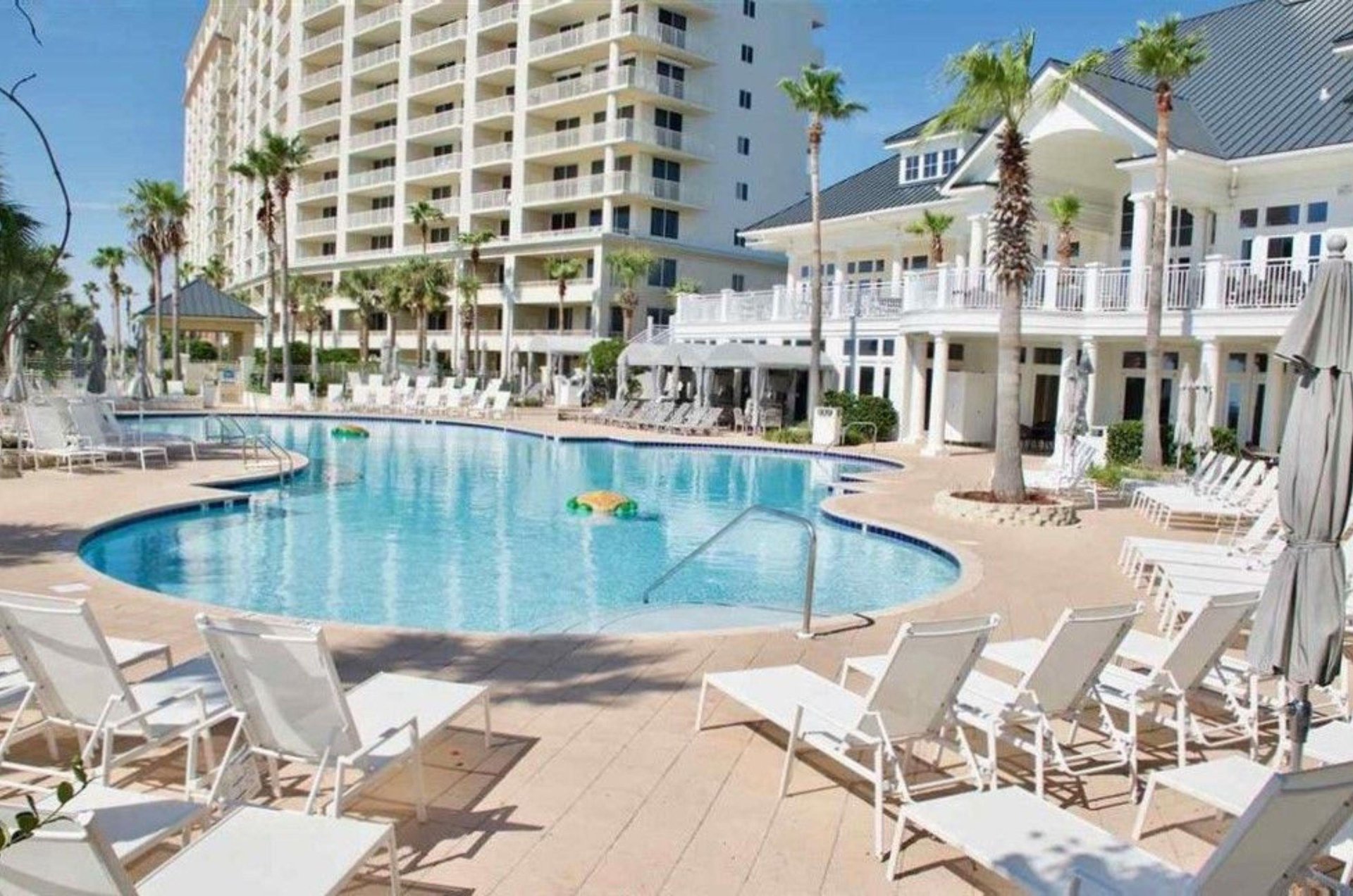 The outdoor pools at Beach Club feature a spacious, relaxing pool deck