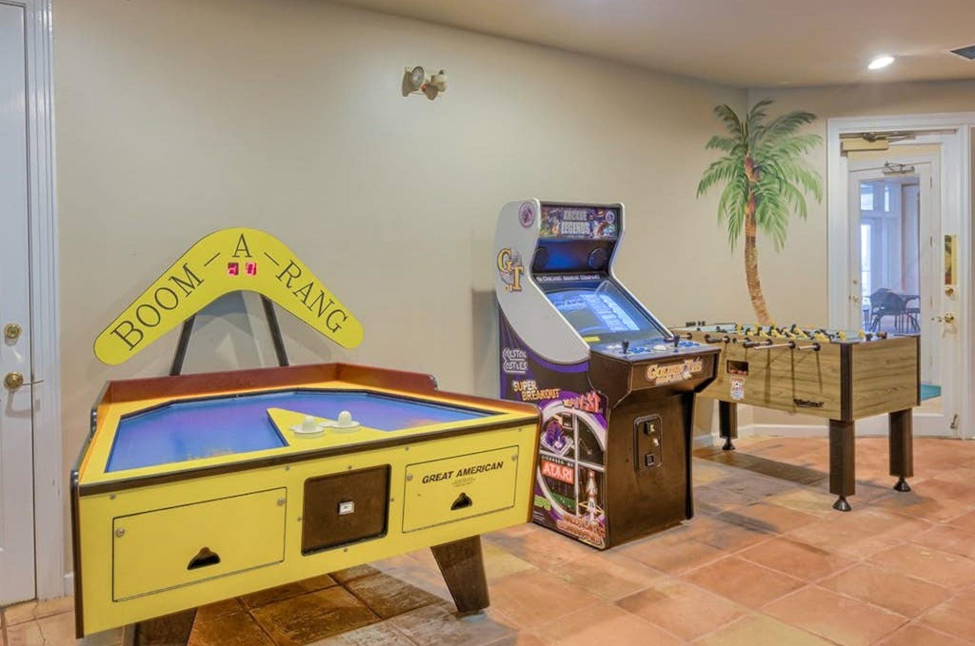 A variety of arcade games in the onsite game room
