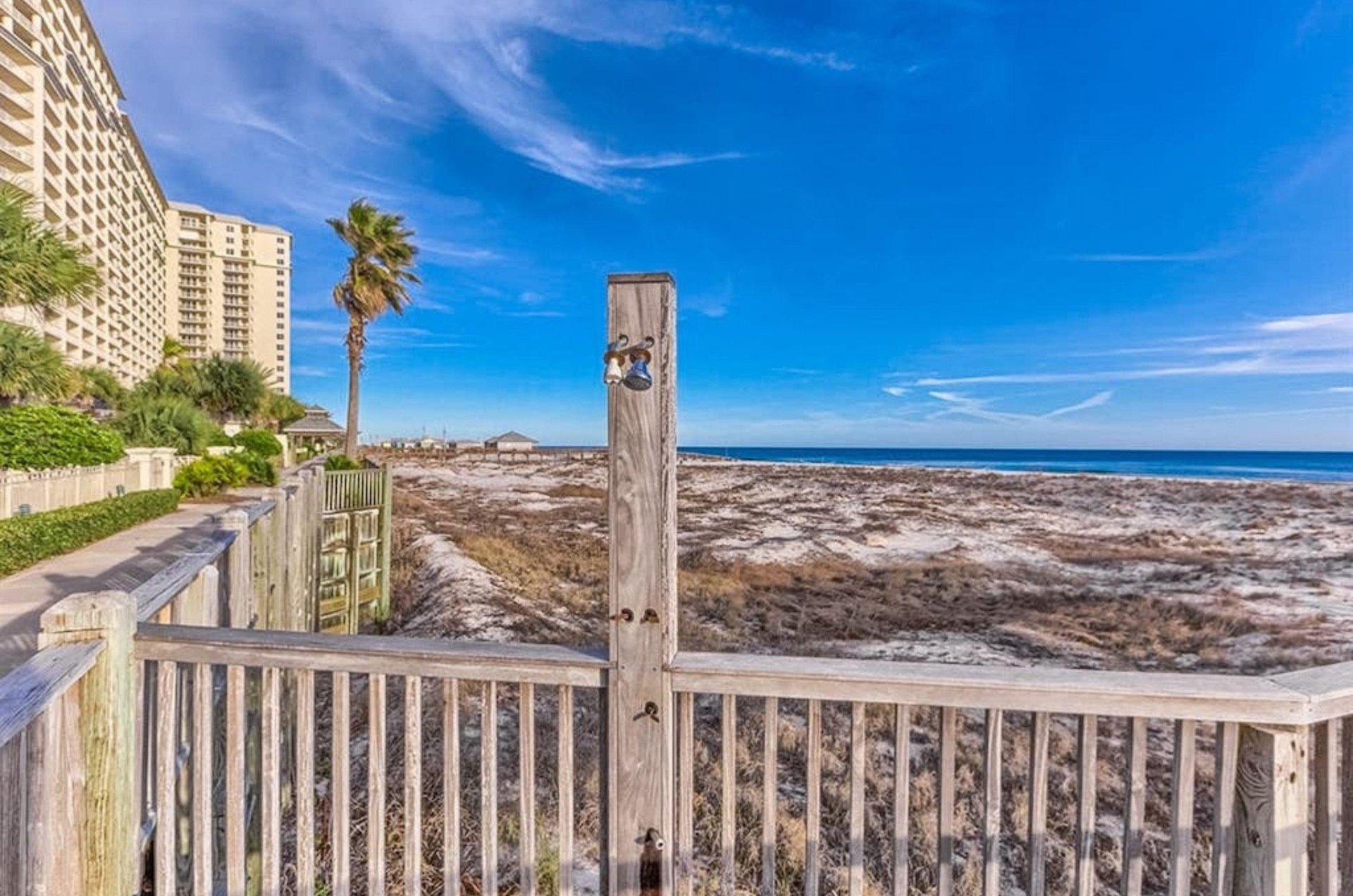 The outdoor shower on the boardwalk at Beach Club Resort