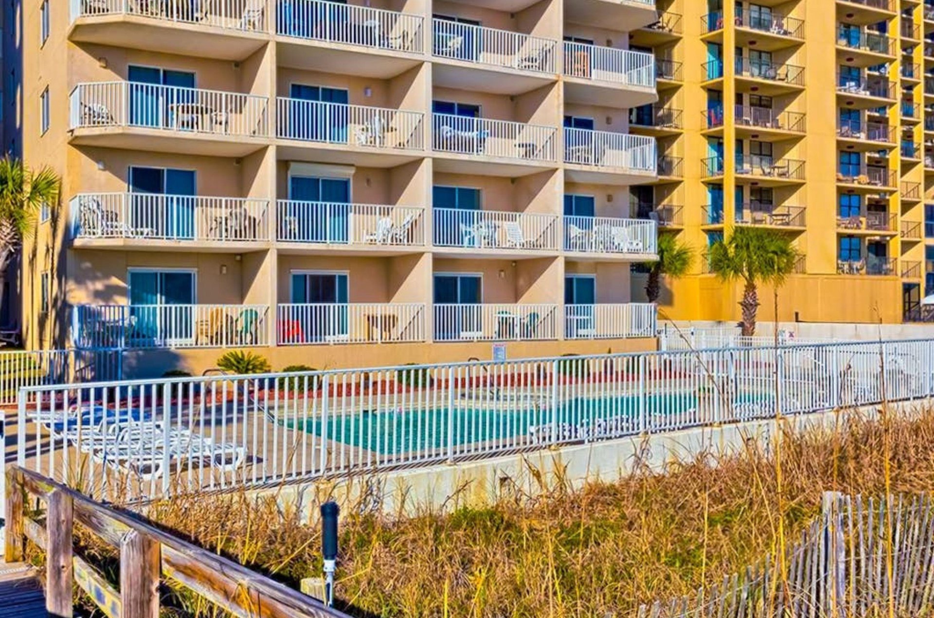 The condo features private balconies overlooking the Gulf of Mexico