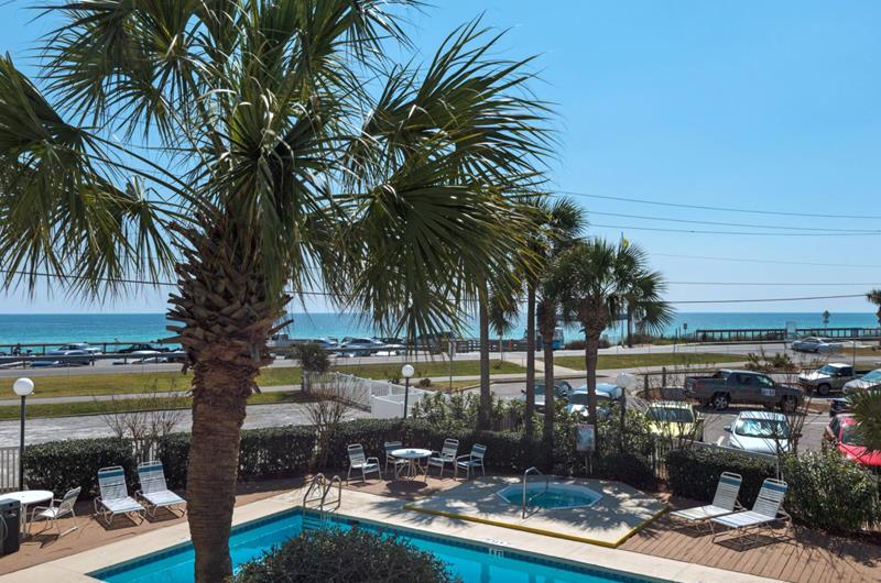 The pool and hot tub with the Gulf just across the street