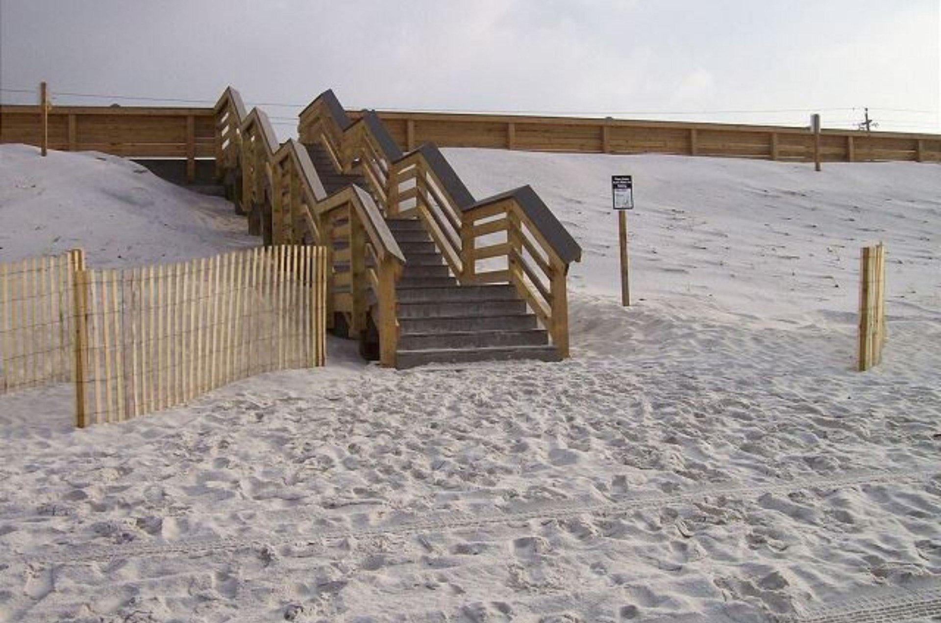 Boardwalk stairs make reaching the beach easy.