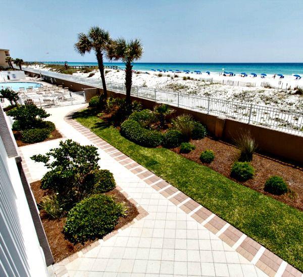 Wellmaintained landscaping surrounds the paths patios and other outdoor areas at Island Princess Fort Walton.