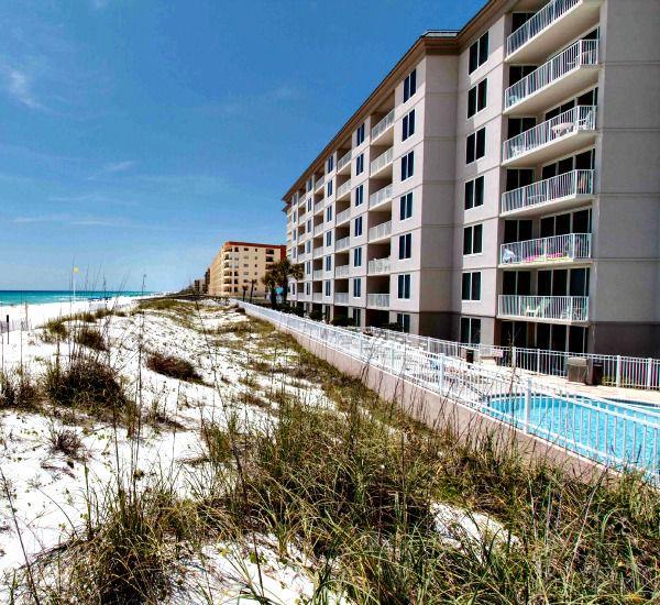 Sea oats and sand dunes outside the Gulfside swimming pool at Island Princess Fort Walton