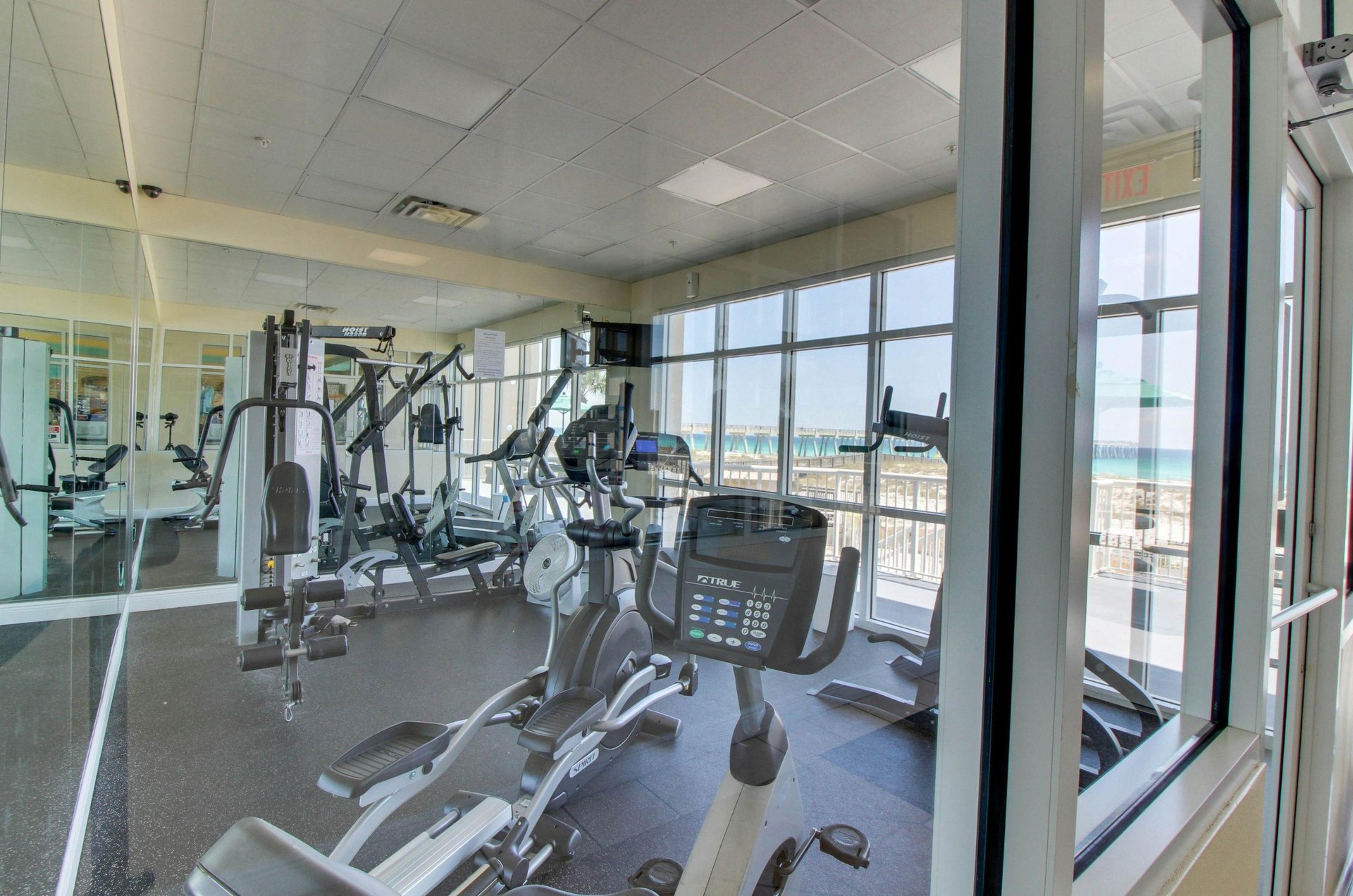 Cardio and strength equipment in the Gulffront fitness center at Summerwind Resort