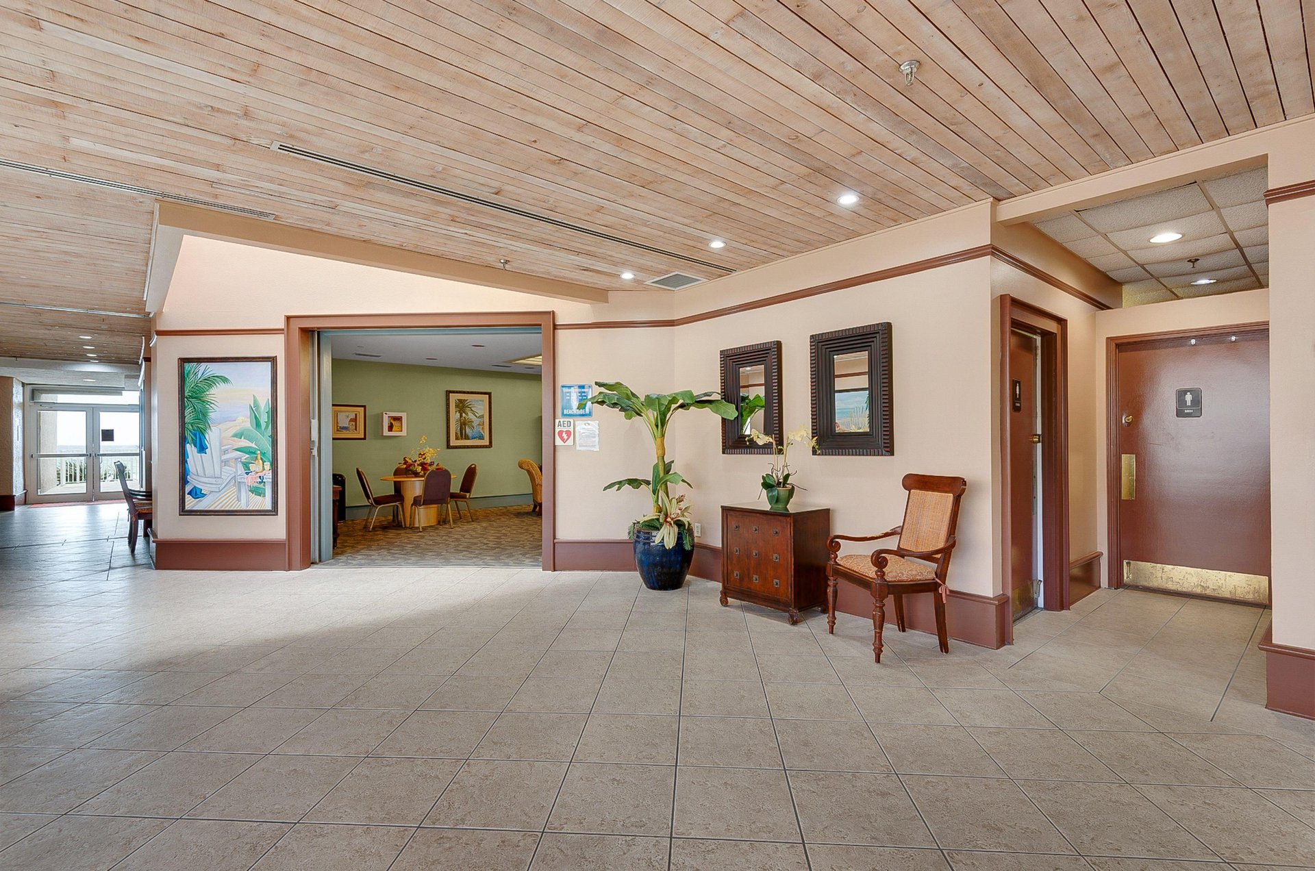 This game room includes a table and chairs where guests can gather.
