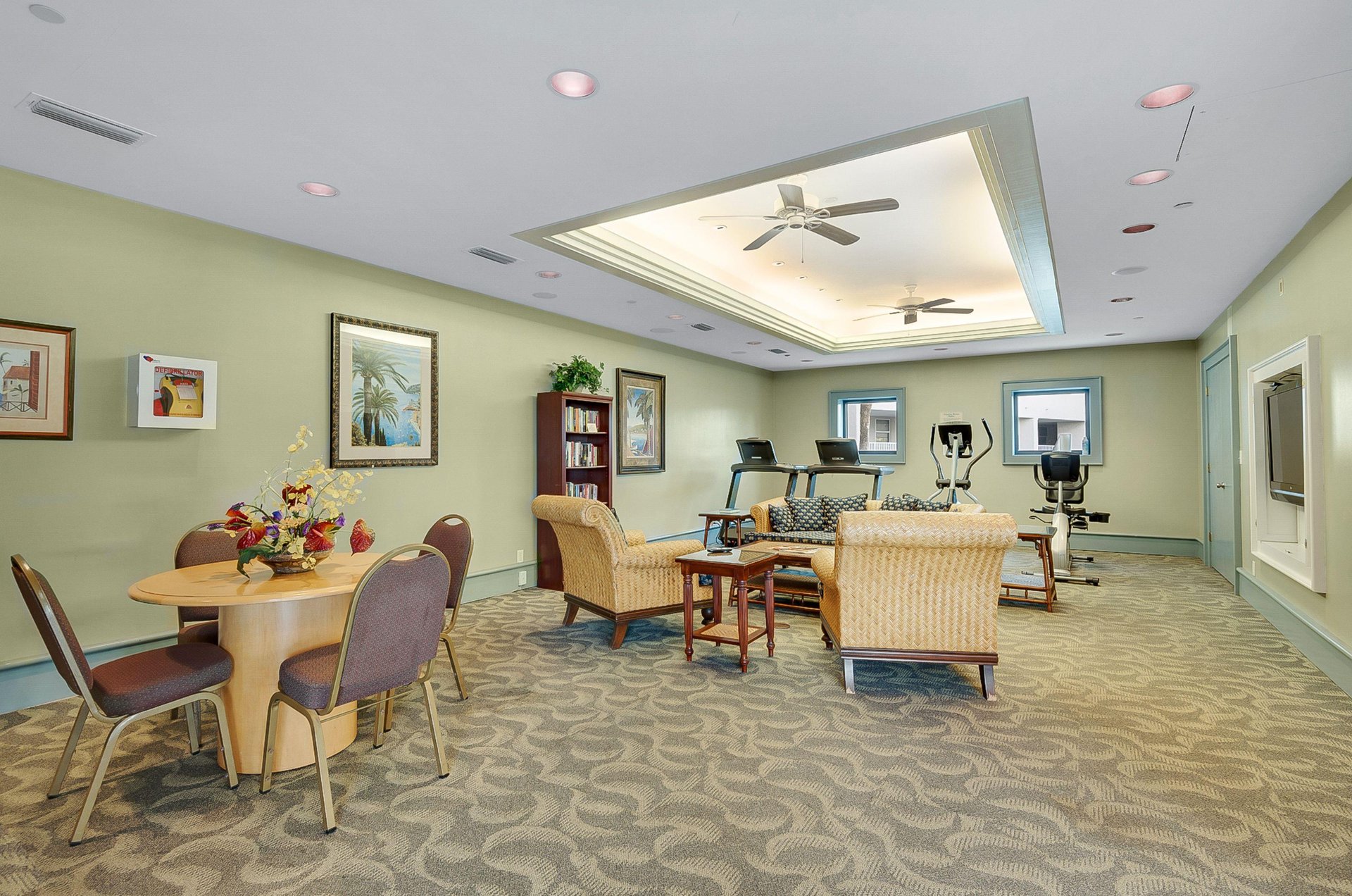 This common room is set up for playing games and exercising.