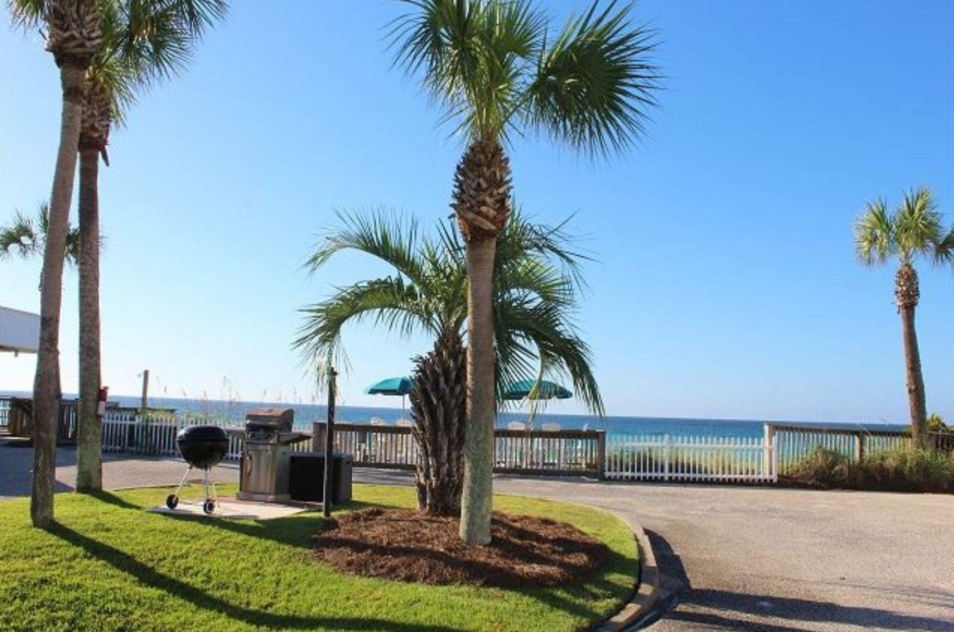 Community grills stand ready for cooking.
