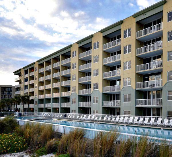 Beachside exterior view of the property and pool at Waters Edge Condos in Fort Walton Florida