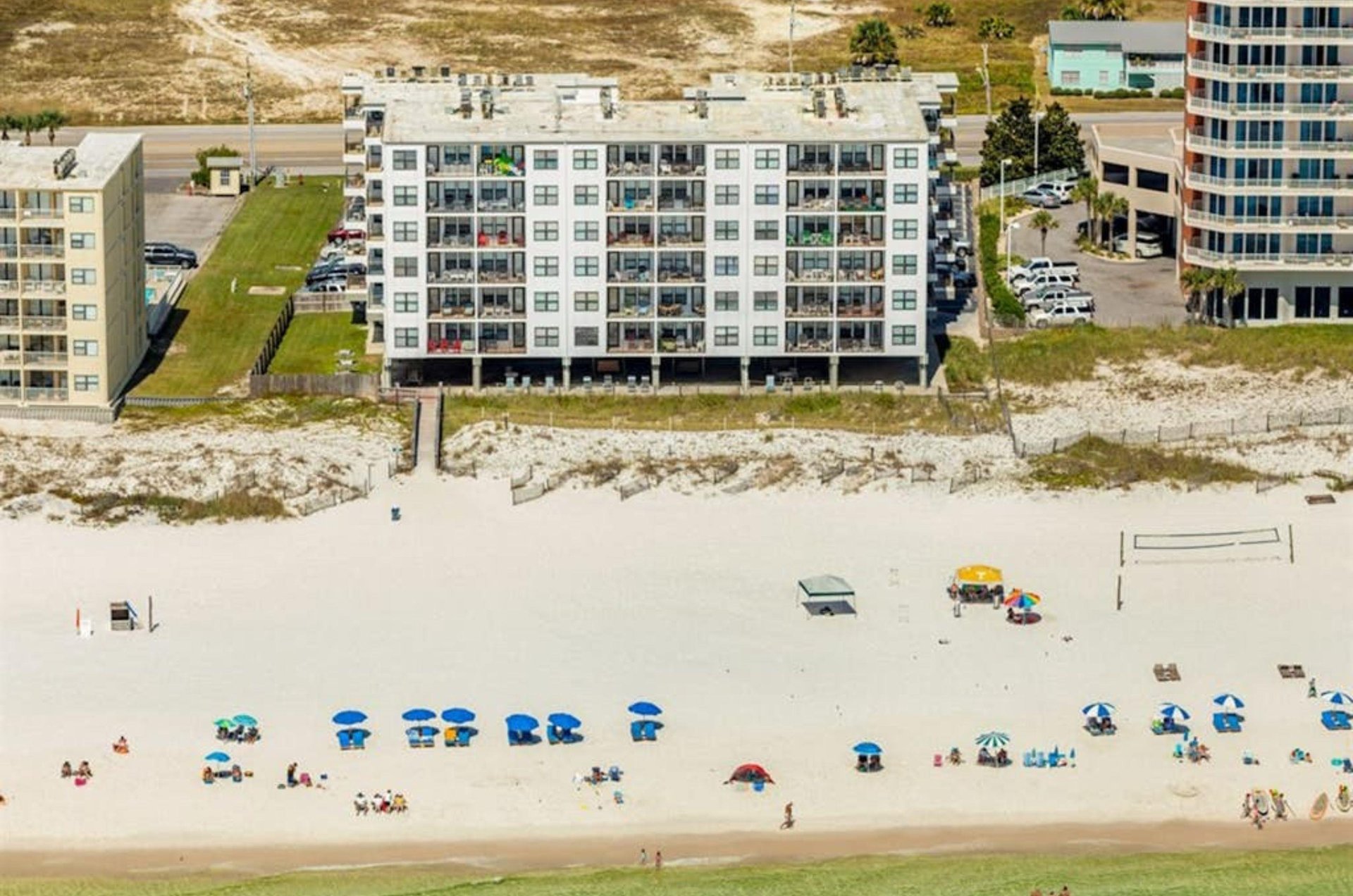 Birds eye view of the beachfront facade of Island Sunrise in Gulf Shores Alabama