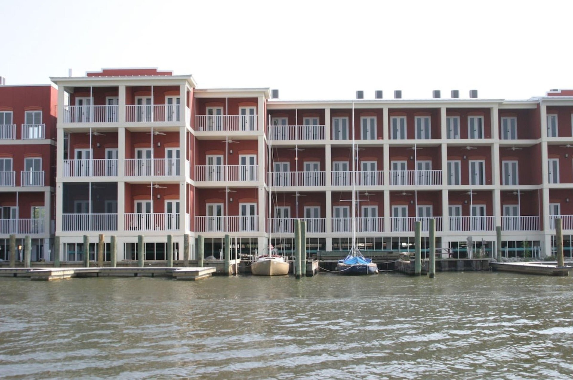 Relax with private balconies and rental boat slips right out back