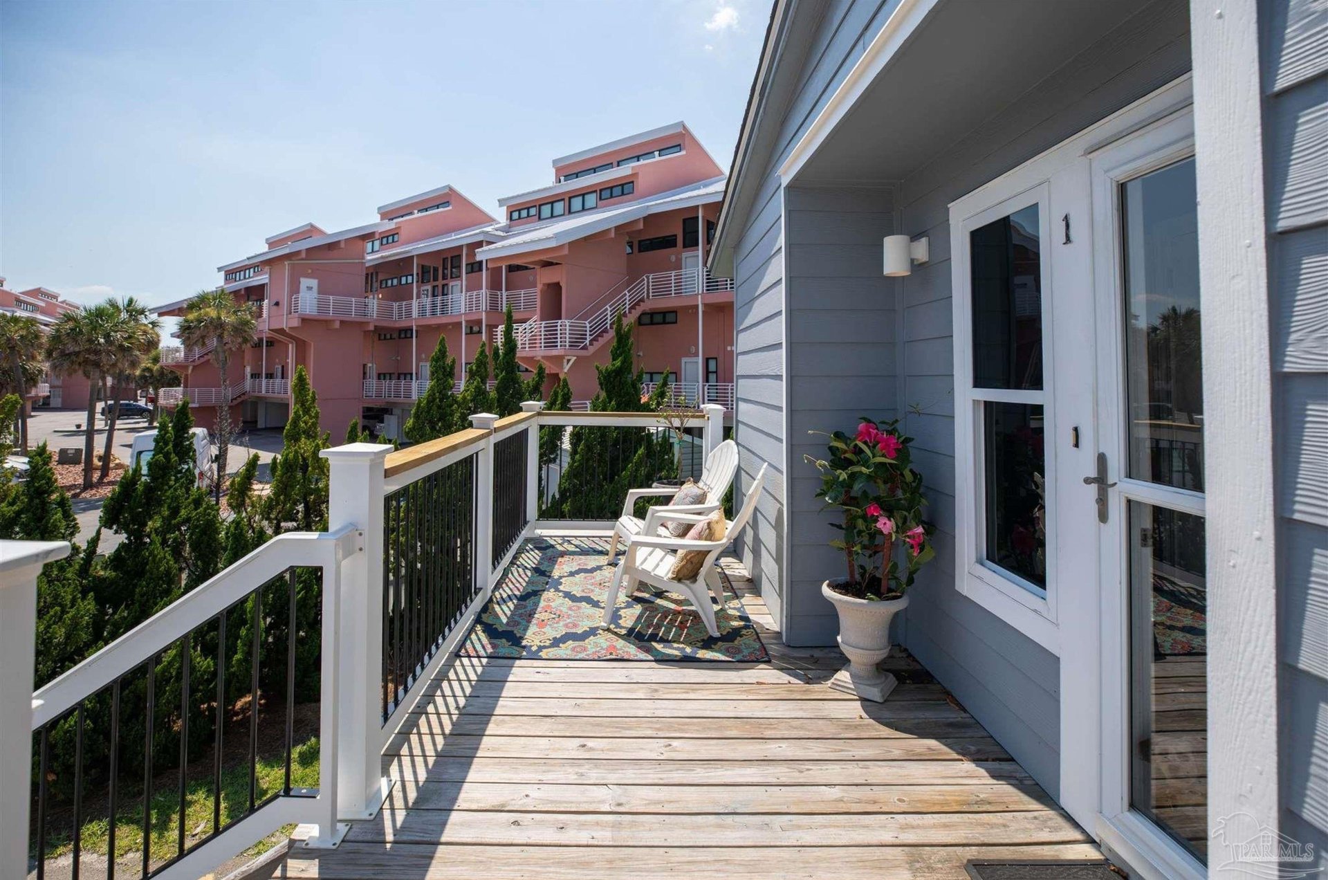 Take in the Gulf scenery from a beachfront balcony at San DeLuna Townhomes
